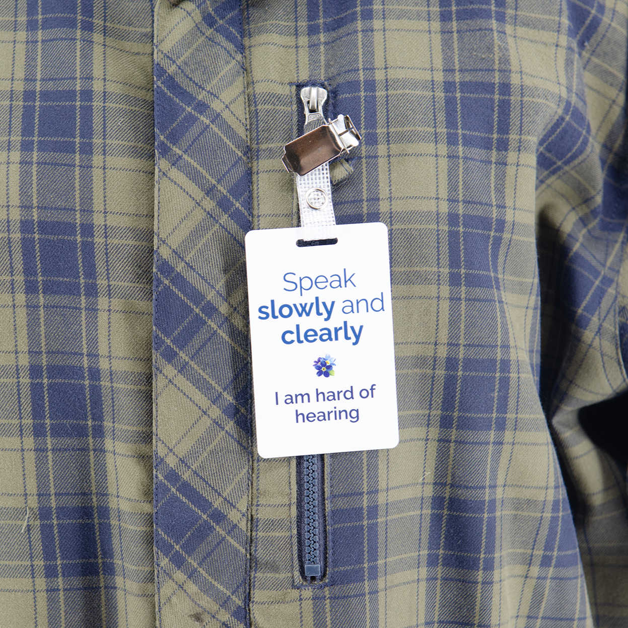 Hard of hearing ID badge with lanyard straps says please speak slowly and clearly