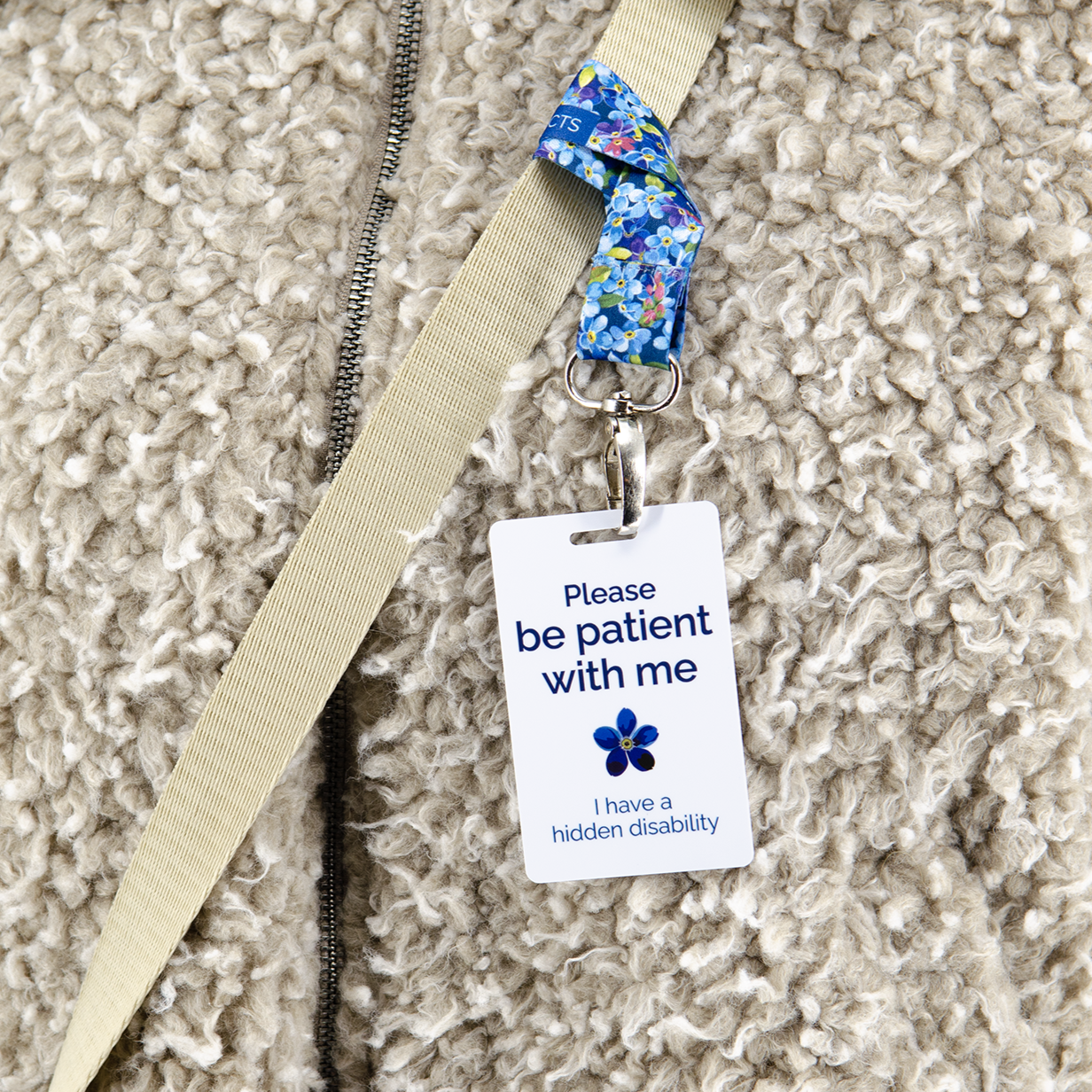 Hidden disability ID badge with clip, lanyard and bag strap