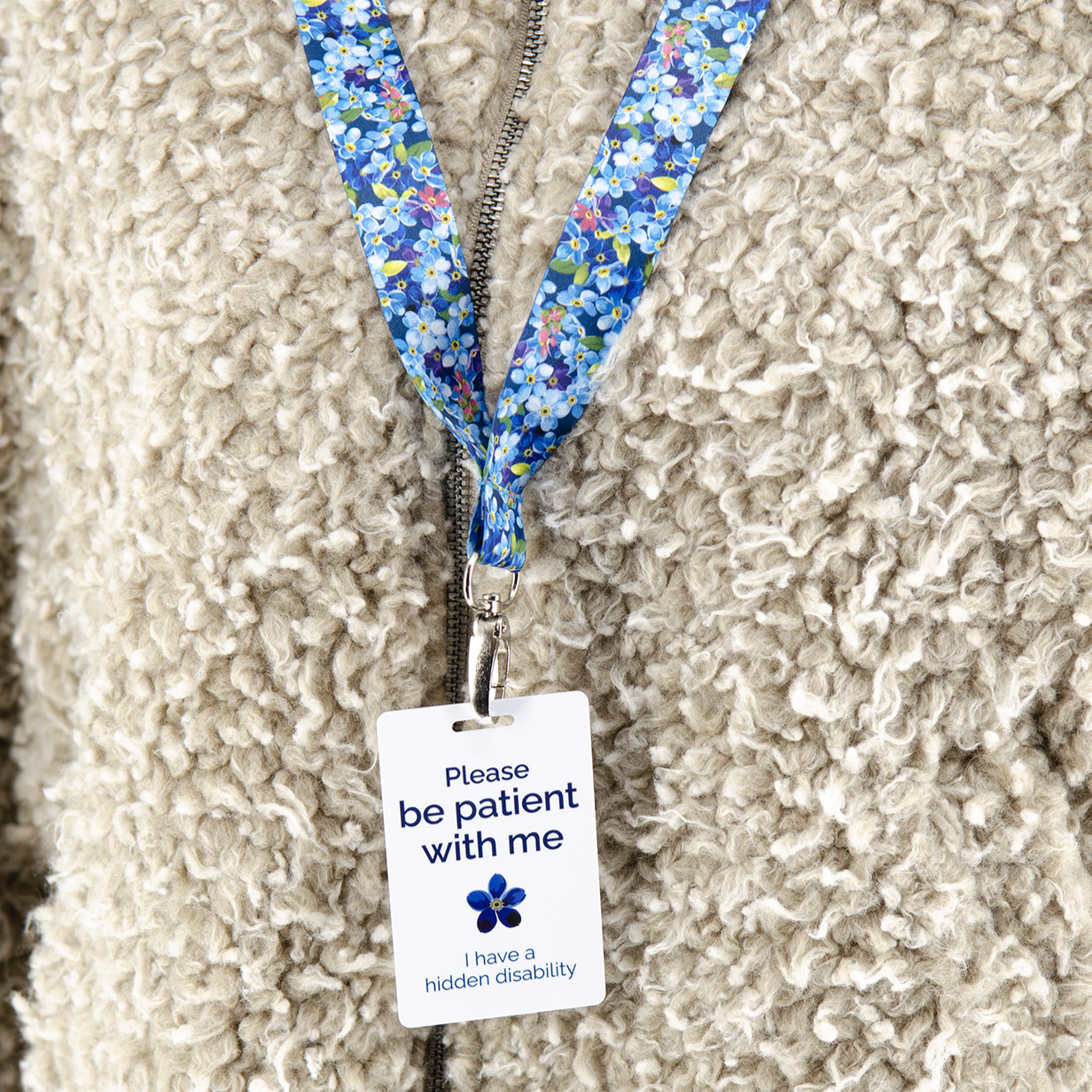 Hidden disability ID badge with clip, lanyard and bag strap
